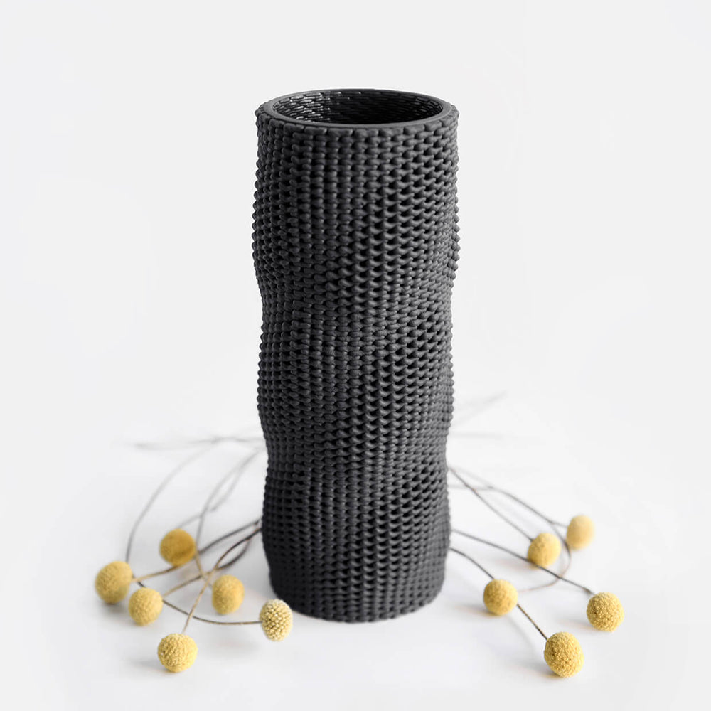 
                  
                    Kilim 3d printed ceramic vase with flowers
                  
                