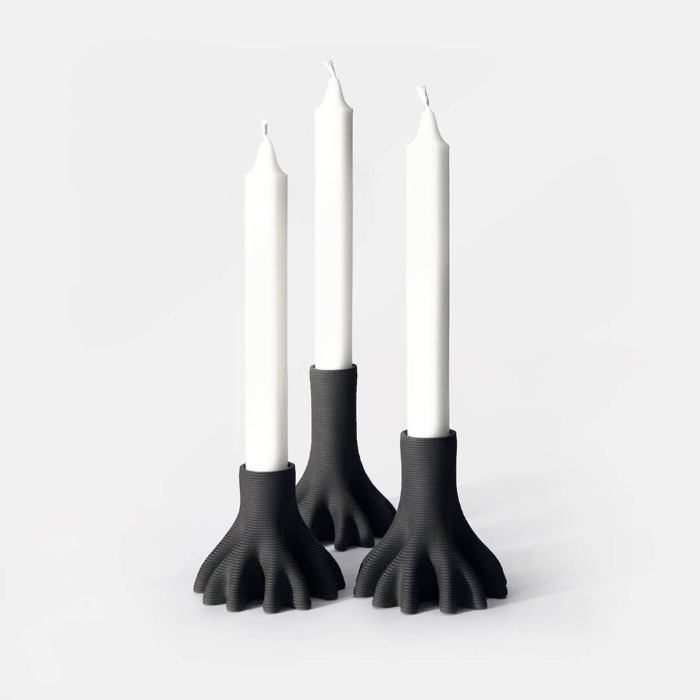 Set of 3 3D Printed Ceramic Candleholders holding candles