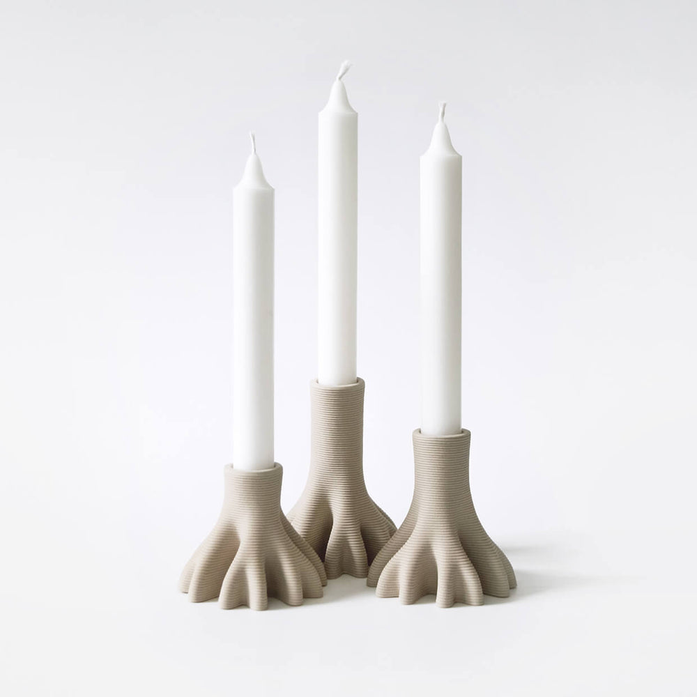 Set of 3 3D Printed Ceramic Candleholders holding candles
