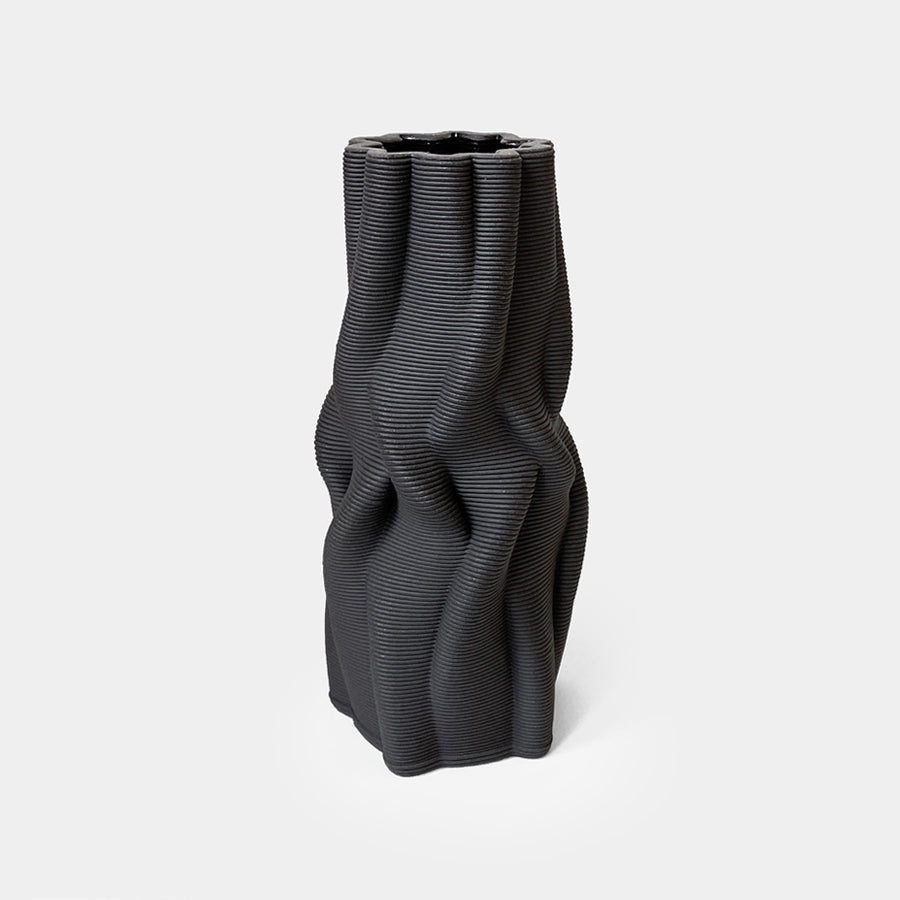 
                  
                    The use of 3D printing minimizes material waste, while the choice of natural clay and the hand-finishing procedure further emphasize it's environmentally-conscious nature.
                  
                