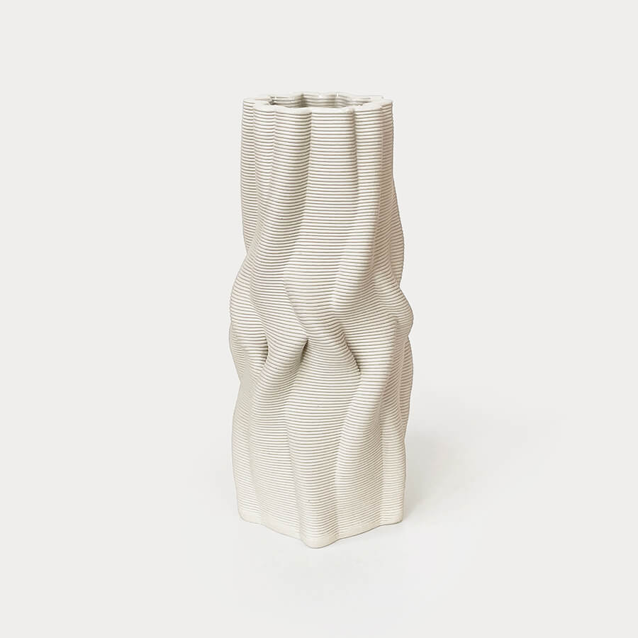 
                  
                    The use of 3D printing minimizes material waste, while the choice of natural clay and the hand-finishing procedure further emphasize it's environmentally-conscious nature.
                  
                