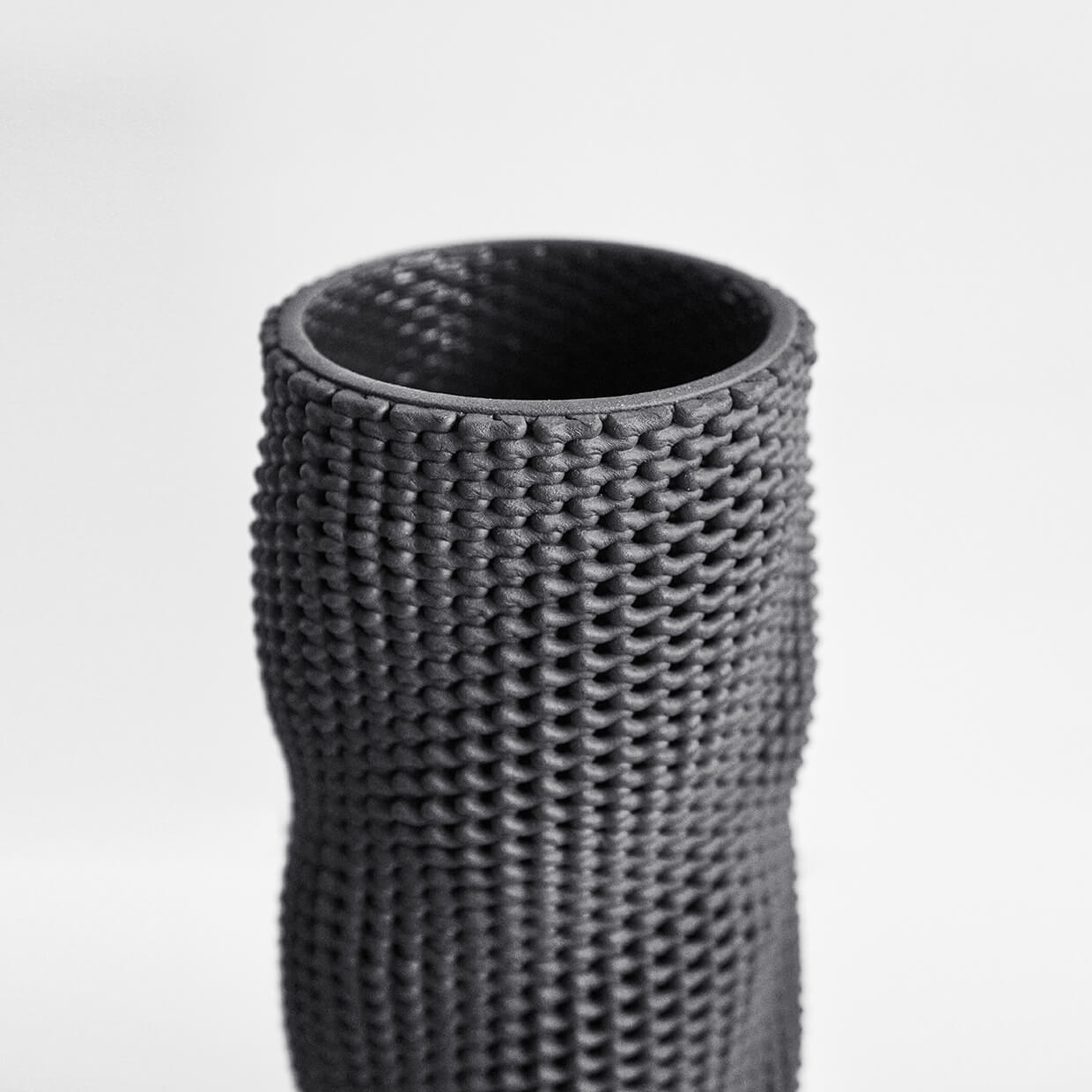 
                  
                    Kilim - 3d printed woven ceramic vase by studio Drag And Drop
                  
                
