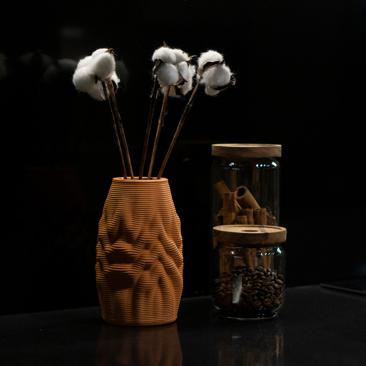 
                  
                    The Melting Vase stands as a testament to the possibilities that arise when artistry and innovation converge. It serves as a captivating centerpiece, effortlessly merging the realms of design and craft, and making a bold statement in any space. It is 3d printed out of natural clay
                  
                