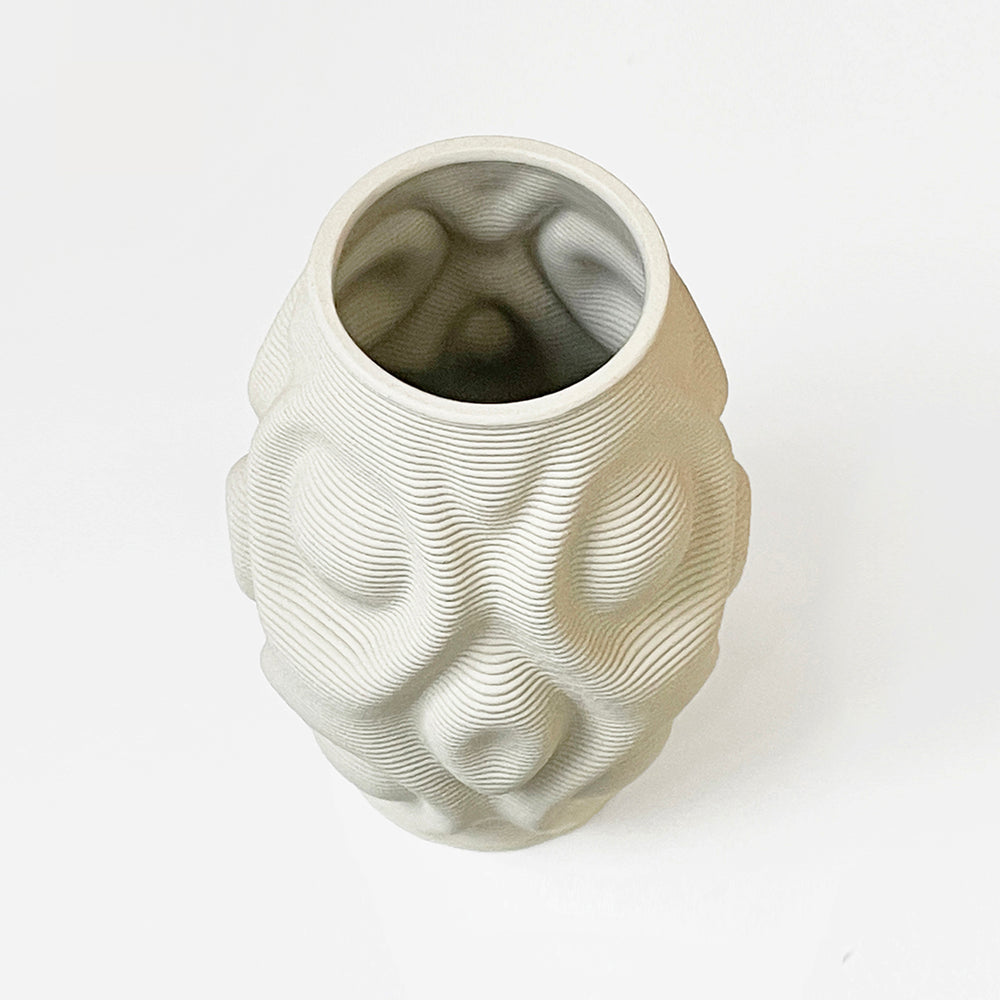 Ripple effortlessly merges design, mathematics, and technology. It serves as a testament to the possibilities of combining nature's beauty with innovative manufacturing techniques like clay 3d printing