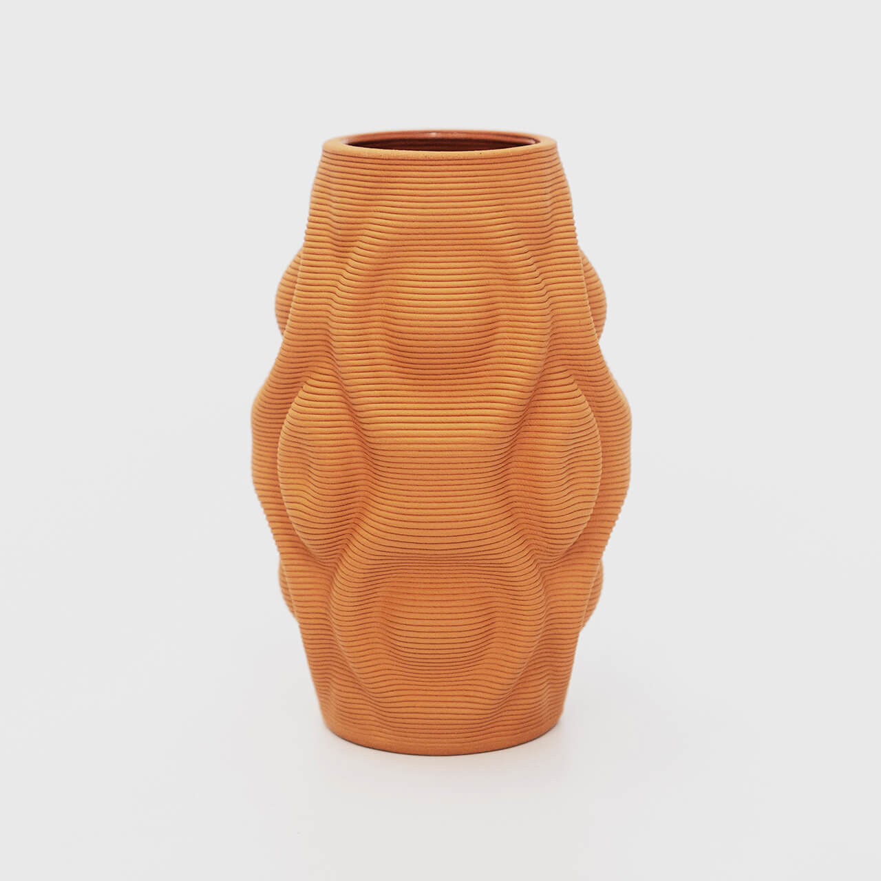 
                  
                    The vase's design features a curvaceous body, mimicking the gentle flow of water. It showcases organic ripples that undulate gracefully, evoking a sense of movement and fluidity. The shape is derived from mathematical formulas, meticulously translated into a 3D printed ceramic vase
                  
                